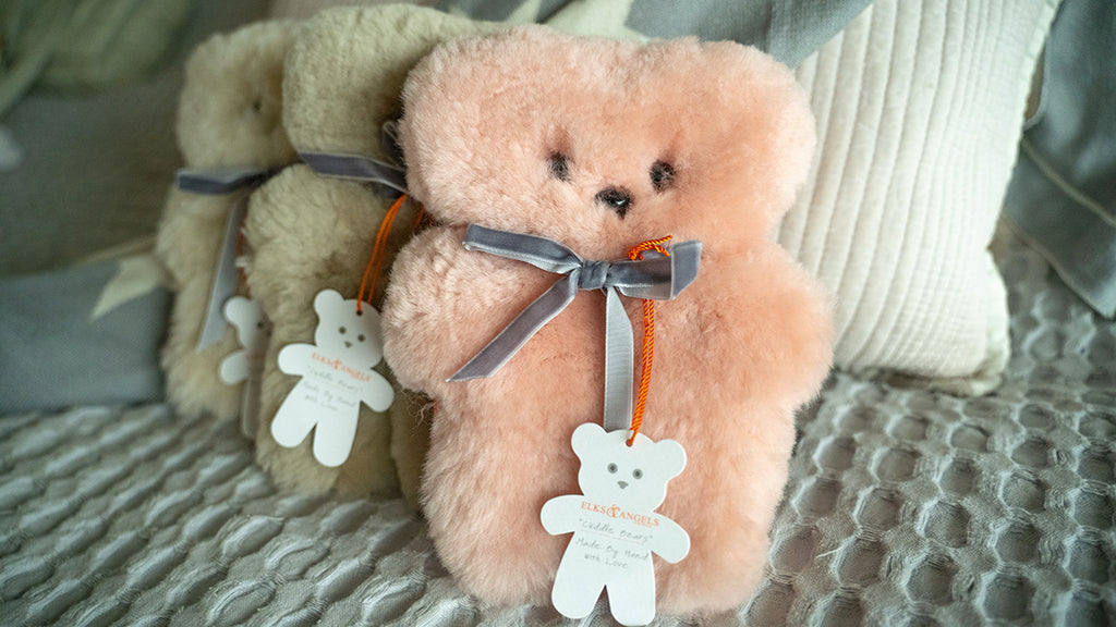sheepskin cuddle bear for baby in pink