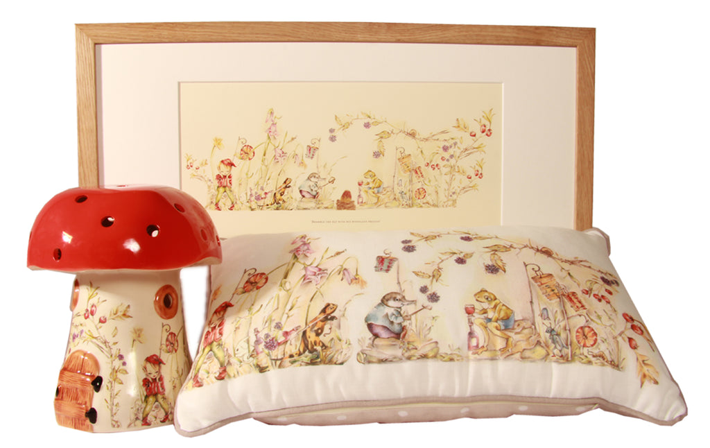 toadstool lamp in red with matching cushion and framed print with woodland scene